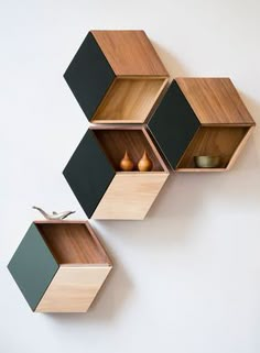 the shelves are made out of wood and have different shapes