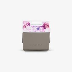 a small gray box with a pink and white design on the front, sitting against a white background