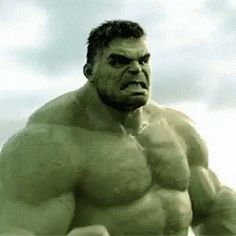 the incredible hulk man is posing for a photo