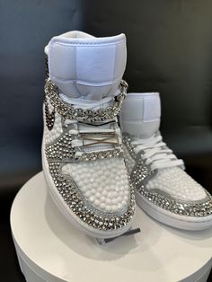 Step up your Jordans game with these fully blinged Jordan 1 mids. These shoes are a great addition for prom, a birthday, a wedding, a night on the town, or your  next event! These shoes can be customized to the colors of your choosing. Not looking for Jordan 1's? Message me with your shoe choice. I'd love to create the custom shoe of your dreams. *Disclaimer We are not associated with the brand, I only hand customize the shoes using rhinestones. Boys Sneaker Ball Outfit Ideas, Custom Jordan Shoes For Women, Sneaker Ball Shoe Ideas, Rhinestone Jordans, Sparkly Jordans, Bedazzled Shoes Diy, Rhinestone Sneakers, Jordan 1 Mids