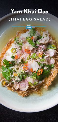 a white plate topped with food on top of a table