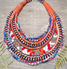 This statement colorful rope necklace has been totally woven in my little studio. Absoltutelly unique and the only one piece of jewelry in a style folk - boho - ethnic. This ethnic inspired necklace is totally eco - friendly. Ideal gift for women which appreciates an ecological lifestyle and they like to distinguish themselves with unique original jewelry. I mix different ends of yarn and matching  knit fabric to create unique  organic fiber jewelry. That's why each necklace in this series is on Fabric Jewelry Handmade, Cloth Necklace, African Inspired Jewelry, Collar For Women, Braided Fabric, Textile Necklace, Fabric Bracelets, Cord Jewelry, Wooden Bracelet