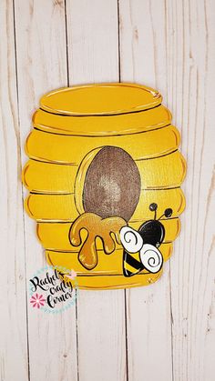 a yellow beehive with a cartoon character on it