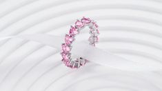 The name says it all, eternity is forever and this light pink heart stone eternity band is a perfect symbol for endless love! Gift this to a loved on this Valentines Day. This ring is a LIMITED EDITION Valentines special. So don't miss out because it wont be restocked once sold out! The Endless Love Ring has PREMIUM pink heart cut stones all around. It can be worn alone or stacked up with other rings to make a powerful impression. Enjoy the luxurious and Timeless design. Material: Full Sterling Pink Adjustable Heart Ring For Promise, Adjustable Pink Heart Ring For Promise, Pink Heart-shaped Crystal Ring For Anniversary, Pink Heart Crystal Ring For Anniversary, Pink Heart Promise Ring For Valentine's Day, Pink Crystal Ring For Valentine's Day, Pink Circular Crystal Promise Ring, Pink Cubic Zirconia Heart Ring For Valentine's Day, Pink Heart Ring For Promise