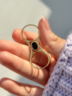 The most versatile ring in any jewelry collection, our innovative Reversible Gemstone Rings are an absolute must have! Black onyx is known as the protector crystal, as it dispels negative energy and heals emotional wounds and protect wearers from danger. The pale rose quartz on the other side is known to inspire unconditional love and peace, it promotes self love and accpetance and the combination of these two powerful crystals will give an unconditional love like no other. Whether you opt for t Reversible Ring, Powerful Crystals, The Protector, Power Crystals, Rose Quartz Crystal, Ring Size Guide, Love Ring, Unconditional Love, Jewelry Pouch