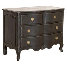 an antique chest of drawers with brass knobs on the top and bottom, painted in dark brown