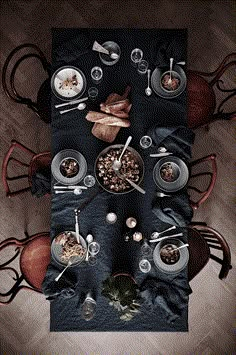 an overhead view of a dining table with food on it