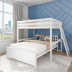 a white bunk bed sitting next to a window