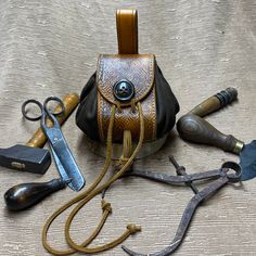 an assortment of tools are laid out on a table