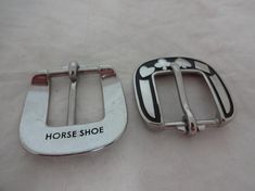 A new pair of buckles from Horse Shoe Brand Hardware, designed by Jeremiah Watt. Stainless steel heel bar buckles in the Card Suit pattern.The sizes reflect the width of material that the buckle will fit on to (the length measured from inner edge to inner edge).  For example, the 1" buckle will fit a 1" wide piece of material.We sell this buckle as singles in the larger sizes.  This is the link to our other listing:https://www.etsy.com/listing/249535978/new-jeremiah-watt-heel-bar-buckle-card Buckle Proposal, Buckle Card, Western Horse Tack, Spur Straps, Horse Ornaments, Suit Pattern, Horse Shoe, Western Horse, Belt Purse