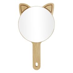 a wooden mirror with a cat's head on the front and back of it