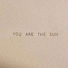 an old typewriter with the words you are the sun printed on it's paper