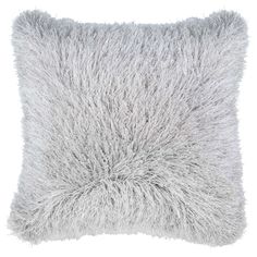 a gray fluffy pillow on a white background