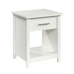 a white night stand with an open drawer on the bottom and one drawer at the top