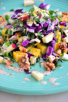 a blue plate topped with lots of food