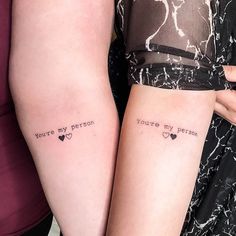 two women with matching tattoos on their arms that say you're my person and you're my person