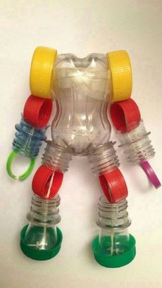 a plastic toy with multiple colored handles and legs