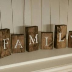 wooden blocks that spell out the word family