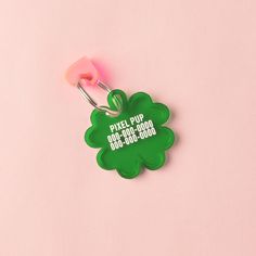 a green keychain that says dixie pop rock - n - roll on it