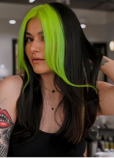 This daring combination of jet-black hair and neon green highlights along the roots creates a statement look that’s perfect for anyone wanting to stand out this winter. The striking green adds a pop of color while the sleek black base maintains sophistication. This type of hairstyle works especially well for those who love experimenting with bold colors and want ideas for brunettes that defy traditional looks. Neon Green Highlights, Dark Winter Hair, Black And Green Hair, Neon Green Hair, Green Money, Colors For 2024, Winter Hair Colors, Jet Black Hair, Money Piece