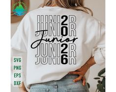 the back of a woman's shirt that says junior junior, junior and junior