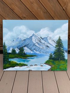 a painting of a mountain lake with pine trees in the foreground