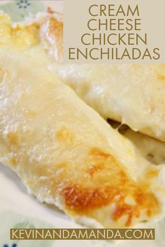 two pieces of cheese covered enchiladas on a plate with the words cream cheese chicken enchiladas