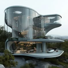 a futuristic house with spiral staircases and glass walls