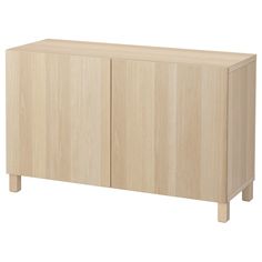 the sideboard is made from wood and has two doors