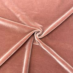 a close up view of a pink fabric