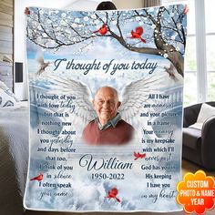 a blanket that has an image of a man with wings on it and the words, i thought you today