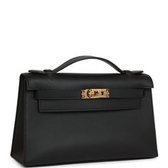 This Mini Kelly Pochette is in black swift leather with gold hardware and has tonal stitching, front flap, two straps with center toggle closure and a top flat handle.The interior is lined with black leather and has an open wall pocket.Collection: UOrigin: FranceCondition: New and never (plastic on hardware) Accompanied by: Hermes box, Hermes dustbag, felt, carebook and ribbonMeasurements: 8.5" width x 5" height x 2.5" depth; 1" top handle Hermes Kelly Pochette, Kelly Pochette, Mini Kelly, Open Wall, Hermes Box, Wall Pockets, Fashion Handbags, New Black, Gold Hardware