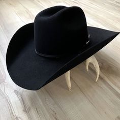 Ariat 6x Hat Black Rabbit Fur 2 Cord Black Band Genuine Sheepskin Sweatband Red Italian Silk Lining Made In The Usa Crown: 4-3/8 Brim: 4-1/4 A Cowboy Has To Have A Great Hat To Be Complete. You Will Love This Ariat 6x Rabbit Fur Hat By M & F Western Products. It Is Complete With 2 Cord Black Band And An Ariat Hat Pin. The Unbeatable Quality And Durability Of This Hat Are Perfect For When You Want To Get Dressed Up, Or Just Hanging Out At The Barn. Treat Yourself Today To This Nice Hat. Cowboy Boots For Men Boot Barn, Men's Cowboy Hats With Matching Boots, Felt Black Hat, Luxury Black Cowboy Hat, Cowboy Hat Black Felt, Rabbit Felt Hat, Coboy Hats, Ariat Hats, Halloween Costume Boots