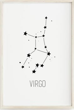 the zodiac sign virgo is shown in black on a white background, framed in a wooden frame