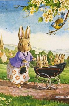 an easter card with rabbits pushing a baby carriage