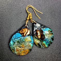 Discover unique handcrafted earrings made from polymer clay and mixed media. Each pair showcases an organic, distressed design that makes a luxurious statement piece, perfect for expressing your individual style. These earrings are lightweight and comfortable for all-day wear. Enjoy complimentary gift-wrapping for added elegance, making them a perfect gift. Elevate your accessory game today and stand out with these exquisite creations! Handcrafted Earrings, Last Minute Gifts, Individual Style, Jewelry Earrings Dangle, Statement Pieces, Etsy Earrings, Dangle Drop Earrings, Polymer Clay, Mixed Media