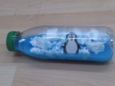 a bottle with a penguin painted on it