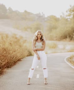 golden hour senior photo shoot in southern California Photography Prop Senior Pictures, Destination Senior Pictures, Best Senior Pictures, Contemporary Senior Photos, Summer Senior Pictures Outfits Jeans, White Jeans Senior Pictures, Cute Senior Picture Outfit Ideas, Summer Park Photoshoot, Rocky Beach Senior Pictures