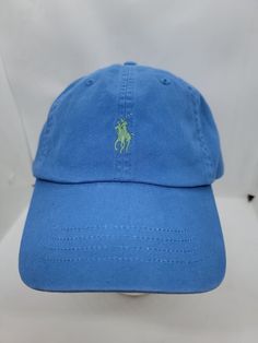 Classic Blue Cap Hat, Classic Blue Baseball Cap For Summer, Classic Blue Cotton Snapback Hat, Classic Blue Baseball Cap One Size, Classic Blue Dad Hat With Curved Brim, Blue Flat Bill Baseball Cap For Spring, Blue Flat Bill Hats For Spring, Blue Casual Hat With Short Brim, Casual Blue Dad Hat For Outdoor