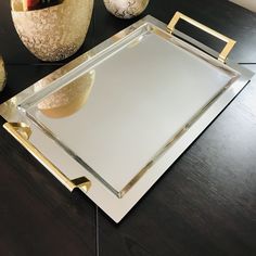 there is a glass tray on the table