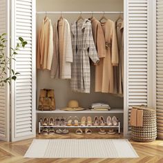 an open closet with clothes and shoes hanging on the wall, next to a rug