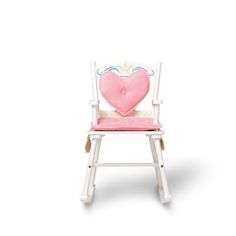 a pink chair with a heart shaped pillow on it's back and seat cushion