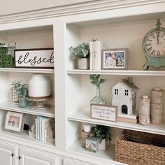 some shelves with pictures and other items on them