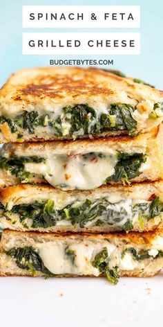 spinach and feta grilled cheese sandwich stacked up on top of each other