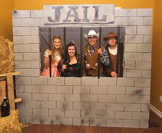 the jail scene is made out of cardboard and has three people behind bars on each side