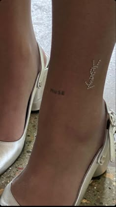 Muse 
Tattoo
Simple tattoo 
Minimalist tattoo Ysl Tattoo, Small Ankle Tattoo, Cute Tats, Cute Tiny Tattoos, Stylist Tattoos, Classy Tattoos, Aesthetic Tattoo, Discreet Tattoos, Sister Tattoos