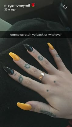 someone with yellow and black nail polish on their nails is saying, lemon scratch yo back or whatever