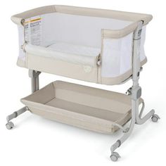 a baby crib with a changing table on it