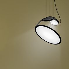 two circular lights hanging from the ceiling