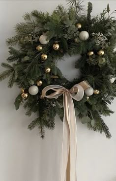 a christmas wreath hanging on the wall